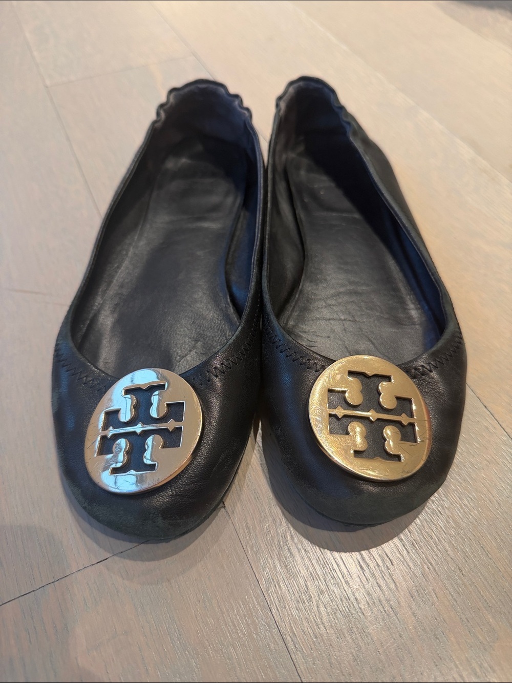 Tory Burch Black Leather Logo Round-Toe Ballet Flats with Metal Emblems
